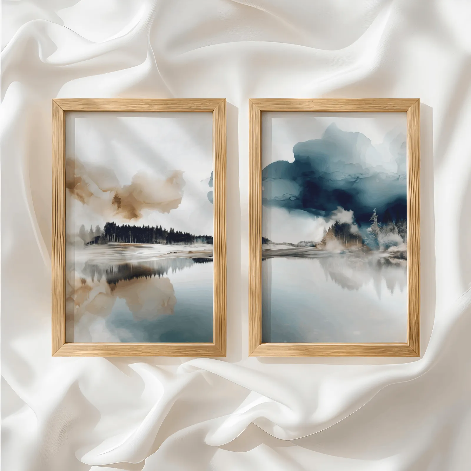 blue and brown misty forest landscape wall art set of 2, side by side atop rumpled white silky fabric